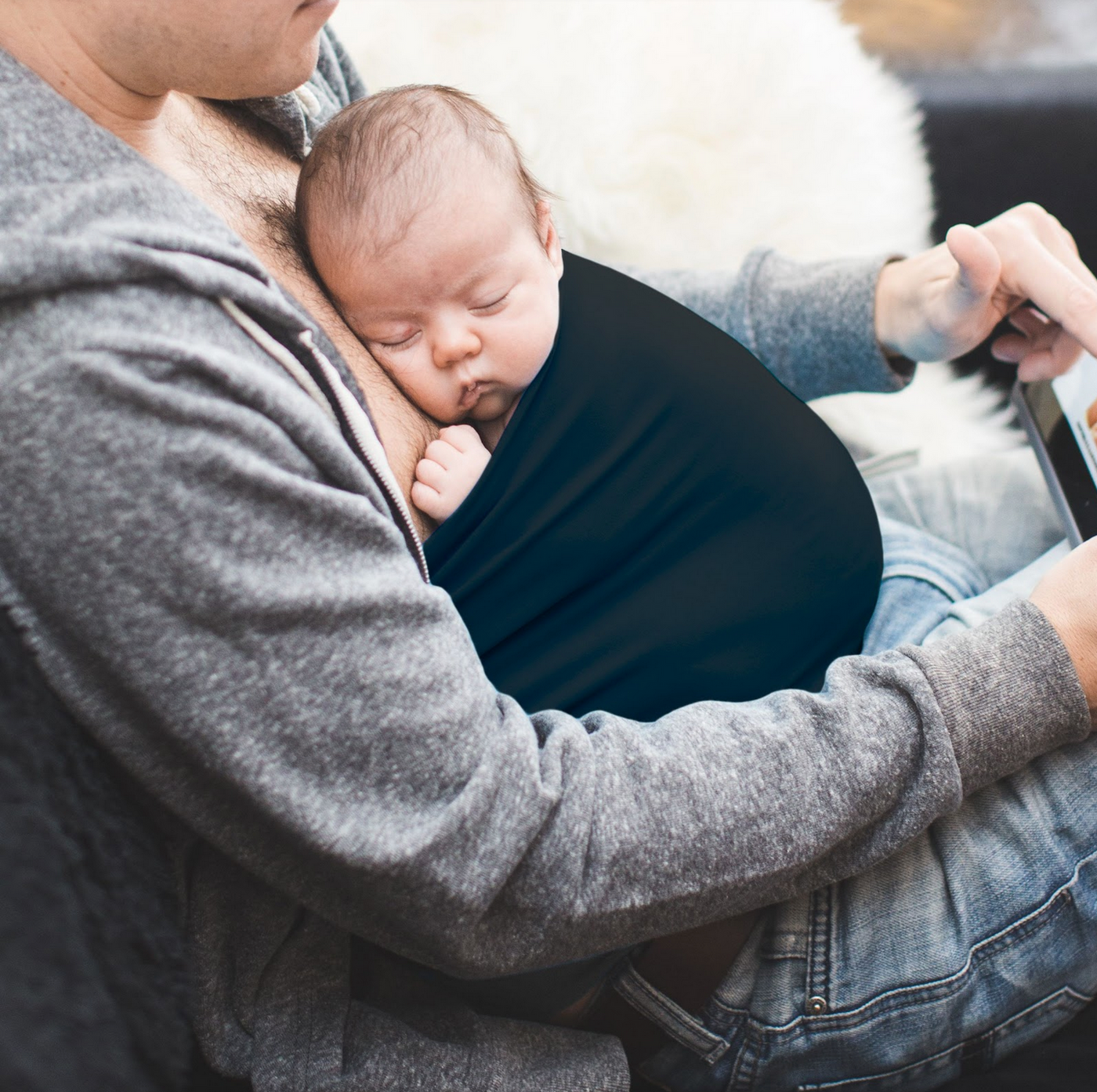 baby sleeping on dad chest